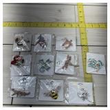 Lot of 10 mint brooches