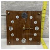Clock with silver coins measuring 8" x 8"; inclu