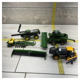 Four-Piece ERTL John Deere and Other Farm Toys Inc