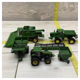 Five-Piece Early ERTL John Deere Toy Tractors and