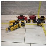 Ten-piece Ertl John Deere And Case Toys (believed