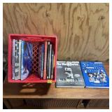 Assortment of sports books and Norman Rockwell 