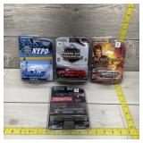 Four GreenLight New-in-Package Toy Cars and Vehicl