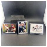Lot of 2 Tom Brady football cards and 1 Joe Montan