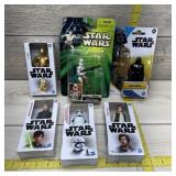 Six-piece Star Wars collectible toy set including