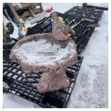Concrete birdbath approximately 2 feet tall