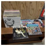 Assortment of 33 RPM vinyl record albums including