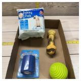 Pet supplies lot. Dog toys and training pads.