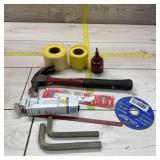 Lot of hand tools. Allen wrenches, hammer, Sawzall