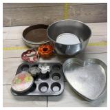 Cookware. Lot of assorted cookie cutters and mixin