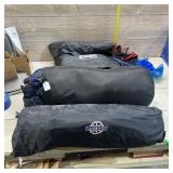 Camping lot. Small tent, sleeping bags, and CamelB