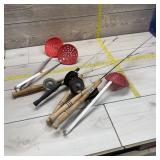 Ice fishing lot. Lot of assorted rods and scoops.