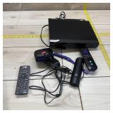 Media Players. Roku and LG DVD player with remotes