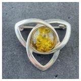 Sterling silver amber brooch. Weight: 3.4 grams.