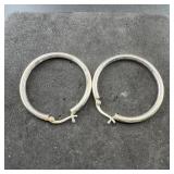 Sterling silver hoop earrings. Marked .925. Weight