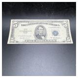 1953A $5 Silver Certificate blue seal note.