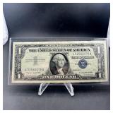 1957-a $1 Silver Certificate Blue Seal Unc.