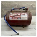 5-Gallon Portable Air Tank ï¿½ Hose and gauge presen