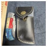 MHS Cutlery Damascus steel folding knife. Includes