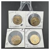 Four presidential dollars including Ronald Reagan