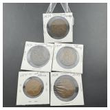 Five foreign coins including large cent pennies.