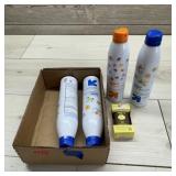 4 Cans Of Sunscreen - New