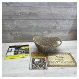 Tin Signs & Calendar In A Wicker Basket