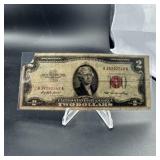 1953 $2 ted seal note with lucky corner tear