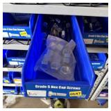 Bolt bin containing assorted hardware and bolts/Mi