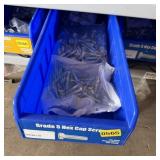 Bolt bin containing assorted hardware and bolts/Mi