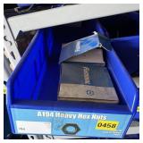 Bolt bin containing assorted hardware and bolts/Mi