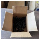 Box of 1/2-inch x 2-1/2-inch machine bolts. See ph