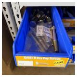 Bolt bin containing assorted hardware and bolts/Mi