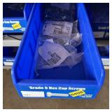 Bolt bin containing assorted hardware and bolts/Mi
