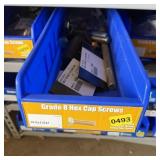 Bolt bin containing assorted hardware and bolts/Mi