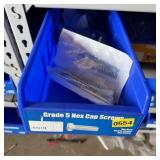 Bolt bin containing assorted hardware and bolts/Mi