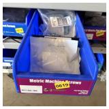 Bolt bin containing assorted hardware and bolts/Mi