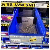 Bolt bin containing assorted hardware and bolts/Mi