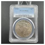 1928 Peace Silver Dollar  Graded Ms62