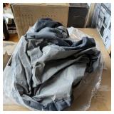 Cloth bed sheet, size unknown, with bed feet. See