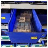 Bolt bin containing assorted hardware and bolts/Mi