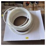 Roll of 1/4-inch nylon tubing. See photos.