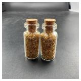 Two Glass Bottles with Gold-Colored Flakes