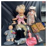 Porcelain, Vinyl, And Cloth Dolls Lot