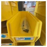 Bag of Metal Washers in Yellow Storage Bin
