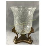 Crackle glass vase featuring a brass stand with