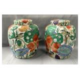 (2) Porcelain ginger jars featuring a vibrant,