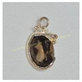 Sterling silver natural smoky quartz pendant.