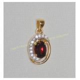 Sterling silver gold plated garnet (0.50 cts) and