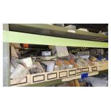 Shelf of Sacks &  Ariens Parts (#1)